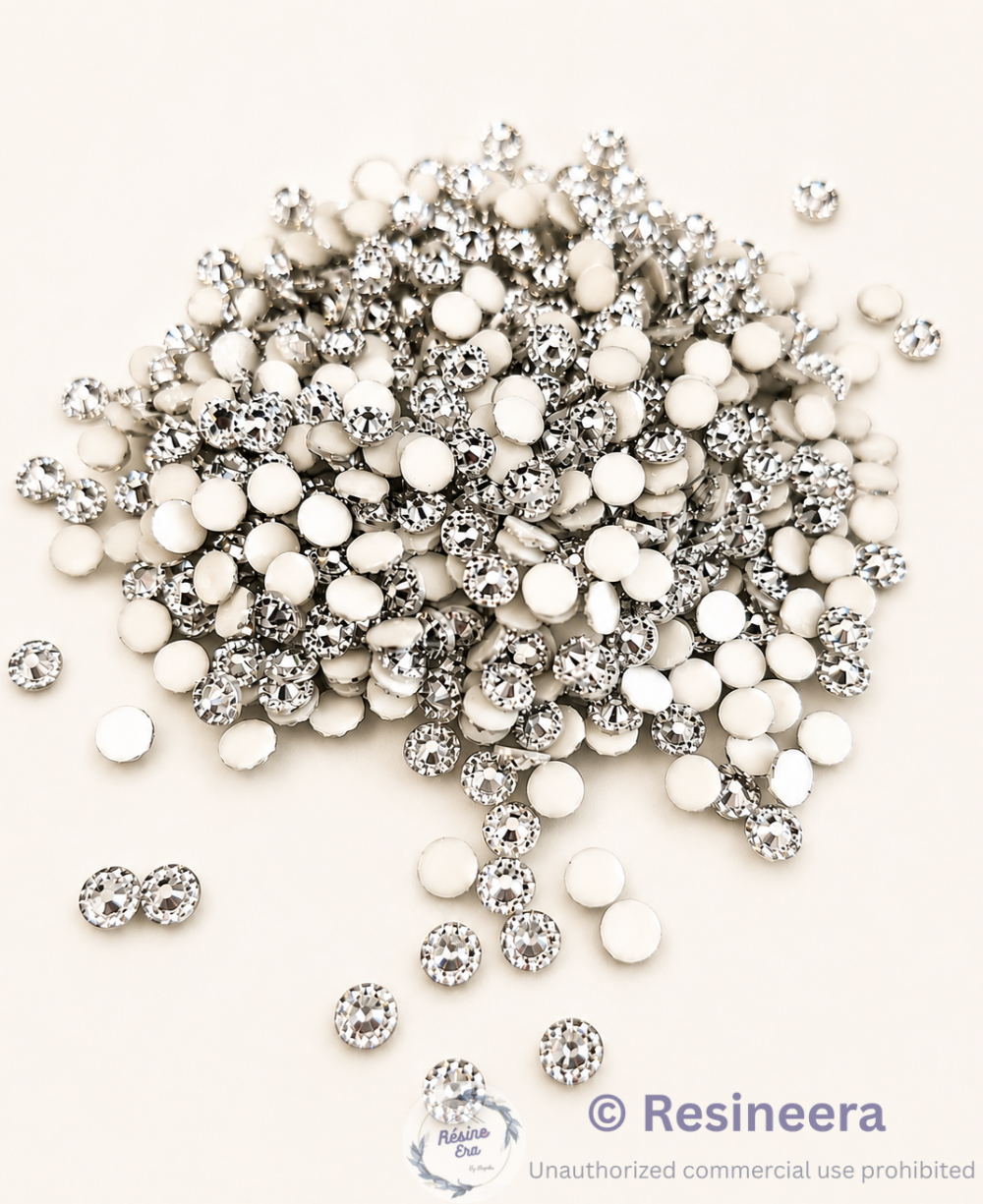 27 flower beads for jewelry making and DIY craft projects on a clean background.