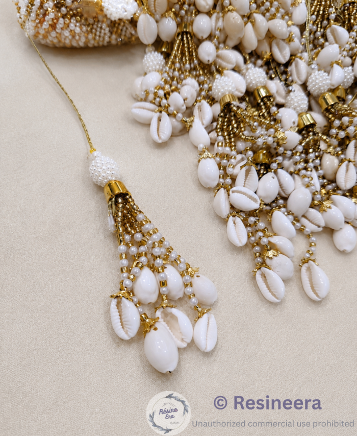 Decorative latkan with shells for craft, jewelry making, rakhi making, and DIY decoration projects.