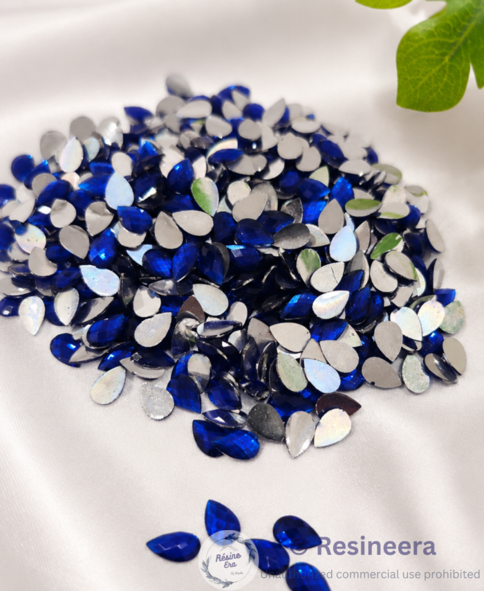 Blue tilak shape flat back acrylic beads for embroidery, DIY craft, jewellery making, and festive decoration.