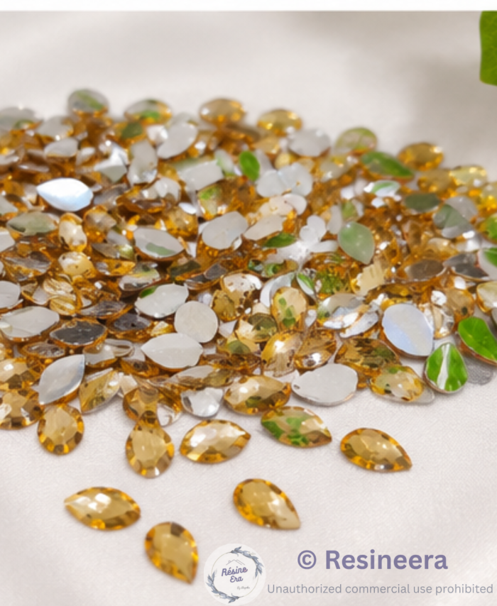 golden tilak shape flat back acrylic beads for embroidery, DIY craft, jewellery making, and festive decoration.