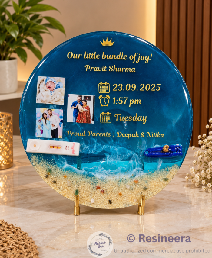 Personalized blue resin baby keepsake plaque with newborn photos, baby name, birth date, time and parents’ names