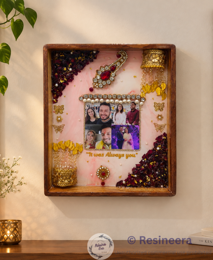 Handcrafted resin flower preservation frame with preserved flowers, photos, and personalized decorative elements